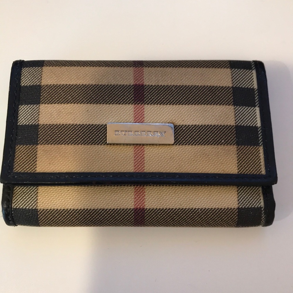 Authentic used Burberry key holder.